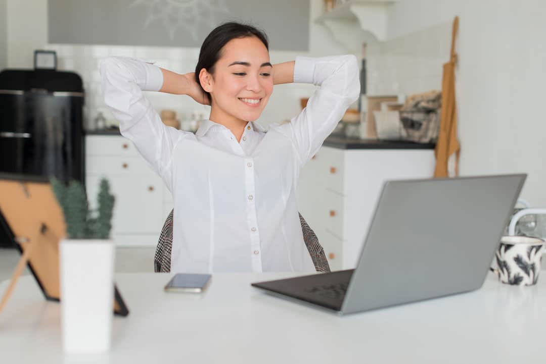 woman-working-from-home A women working remotely in a luxury hotel in Cape Town