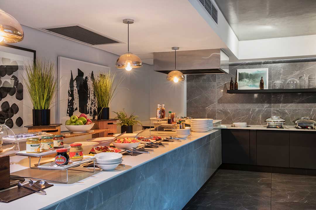 Buffet with lots of food to choose from on a table