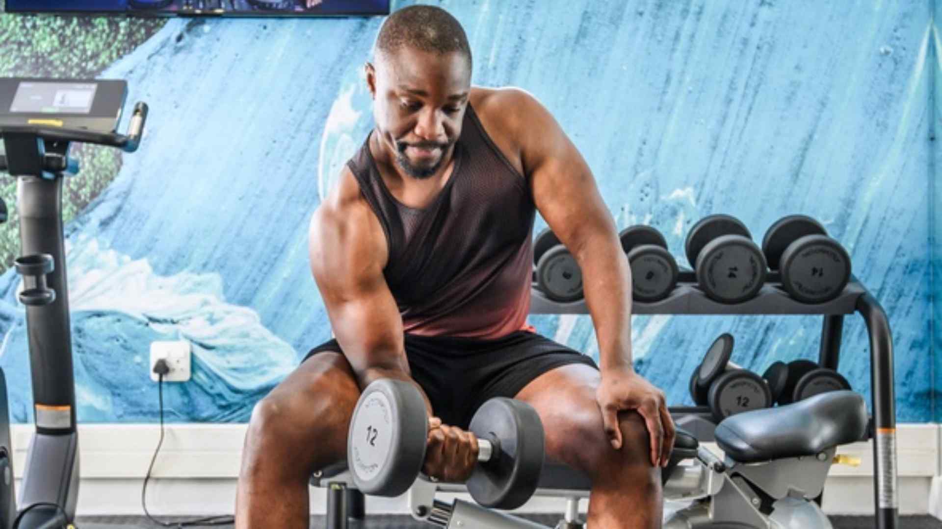 Guest training with dumbbells in the hotel gym